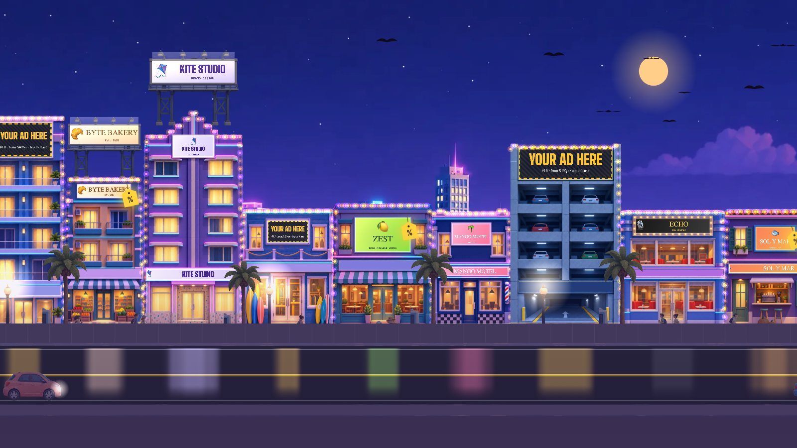 Ocean Ave at night with neon lights and Halloween decorations.
